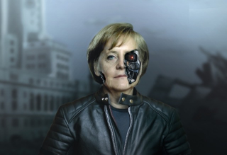 Illustration for article titled Why Is Angela Merkel Always Palling Around With Robots?